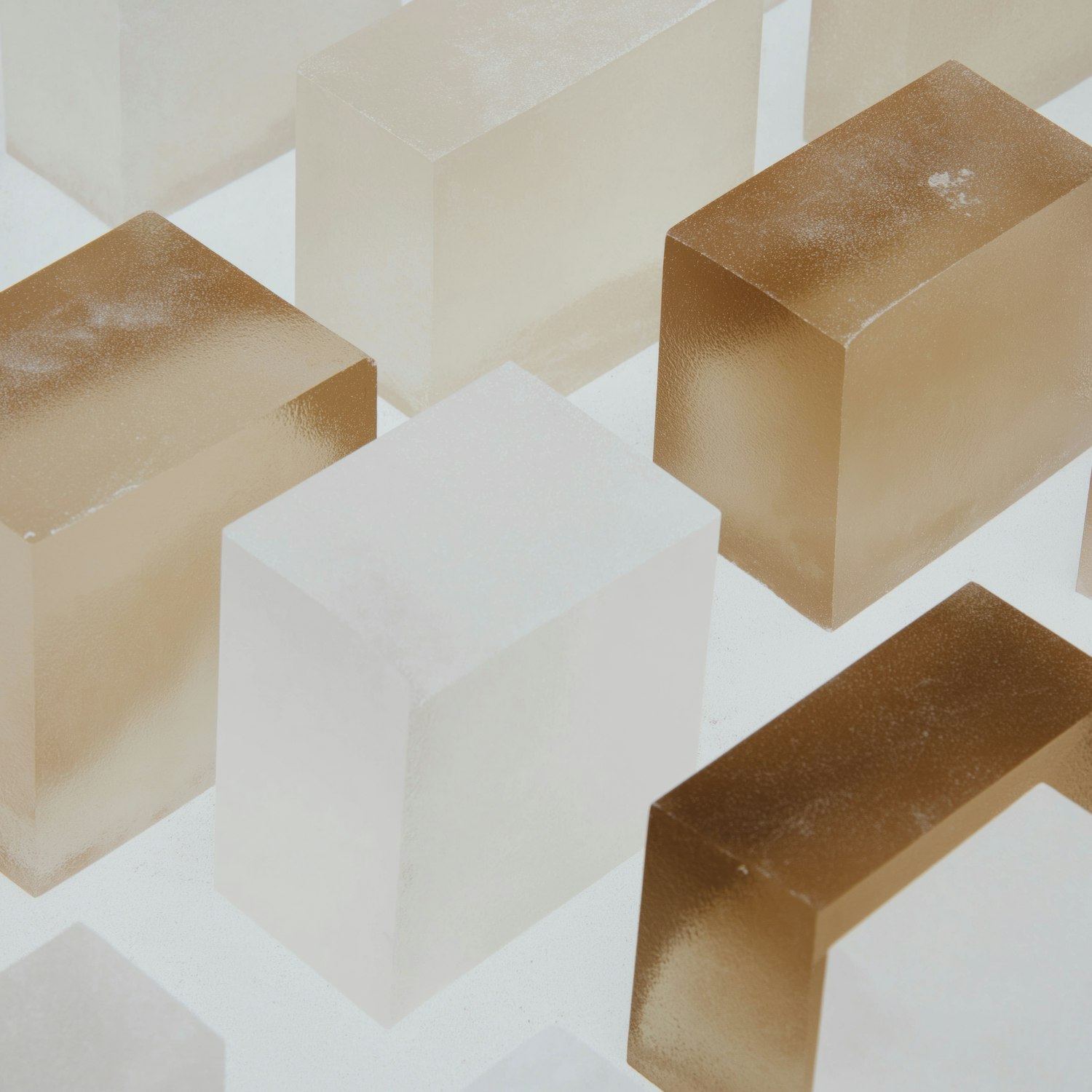 Translucent white and amber blocks arranged in a grid
